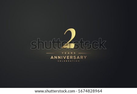 2nd  anniversary background with illustrations of gold colored figures on a black background.
