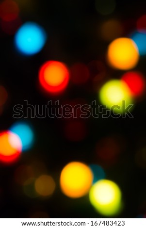 holiday bokeh blurred on a dark background