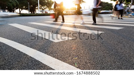 Group of people walking on the crosswalk. Royalty-Free Stock Photo #1674888502