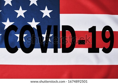 Coronavirus COVID-19 outbreak in america. USA flag with inscription covid-19. Closed Borders in United States of America.