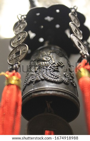 feng shui bell, decorative element, fashion and style Royalty-Free Stock Photo #1674918988