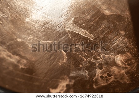 golden glossy background. texture. reflection and stains