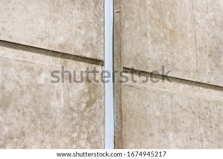 Concrete Wall. Concrete  Expansion  Joints. Polyurethane putty sealant Royalty-Free Stock Photo #1674945217