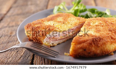 cordon bleu- chicken fillet with ham and cheese Royalty-Free Stock Photo #1674957979