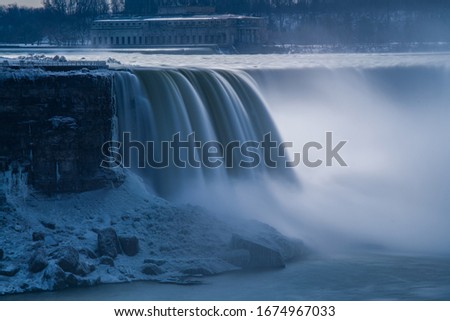 Niagara falls long exposure photo on winter in the evening