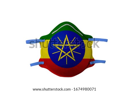 .Face mask with the image of the national flag of Ethiopia. Isolated on a white background.