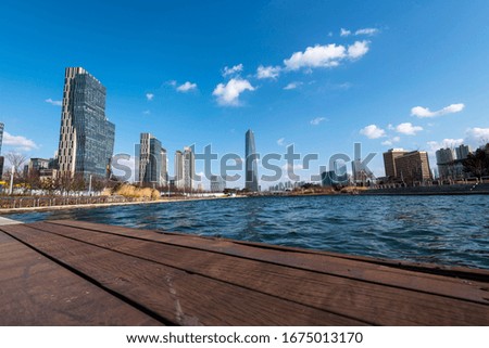 Pictures of lakes, buildings and clouds in the park