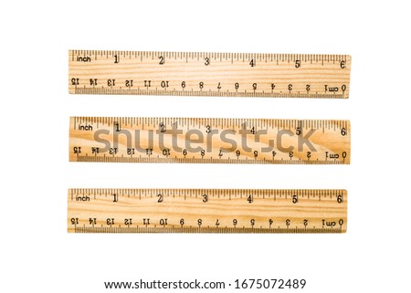 wood ruler close up isolated white background, office supplies and school learning,  Royalty-Free Stock Photo #1675072489