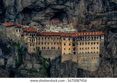Turkey. Region Macka of Trabzon city - Altindere valley. The Sumela Monastery - 1600 year old ancient Orthodox monastery of the Panaghia located at a 1200 meters height on the steep cliff Royalty-Free Stock Photo #1675087456