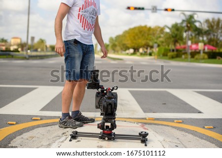 Cameraman with digital cinema camera