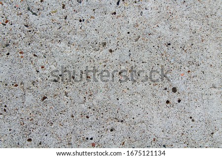 Old reinforced concrete wall. Close-up. Background. Texture.