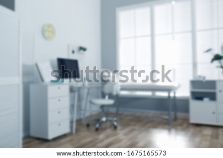 Blurred view of modern medical office. Doctor's workplace Royalty-Free Stock Photo #1675165573