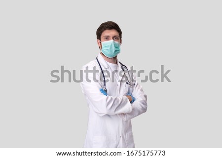 Doctor Wearing Medical Mask and Gloves Isolated Royalty-Free Stock Photo #1675175773