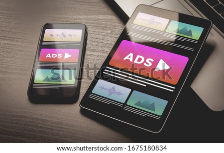 Programmatic Advertising concept. Youtube Online native targeting ads marketing strategy. Inbound Advertising media banner block when viewing a site on a mobile phone and tablet pc screens Royalty-Free Stock Photo #1675180834