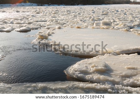 dangerous ice movement on a fast winter river