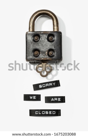 Padlock with label sorry we are closed isolated on white background. Closed by coronavirus or covid-19 concept