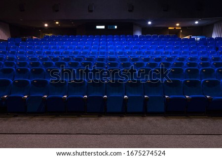 General plan of empty blue cinema seats. Deserted movie theater. Watching the movie. New movie. panoramic photo