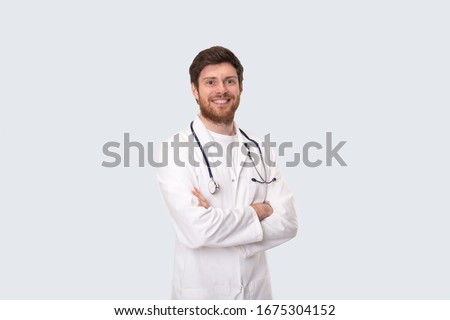 Man Doctor Smiling Hands Crossed Isolated Royalty-Free Stock Photo #1675304152