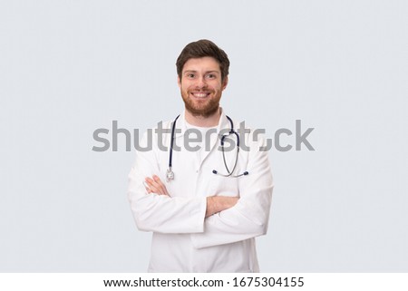 Man Doctor Smiling Hands Crossed Isolated Royalty-Free Stock Photo #1675304155
