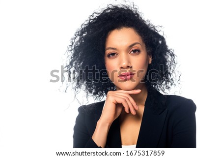 Portrait of attractive african american woman looking at camera isolated on white