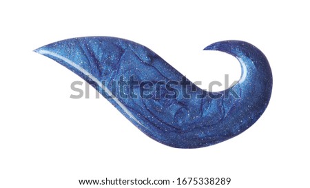 Blot of blue nail polish isolated on white background. Photo. Top view