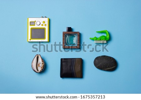 a fantastic studio shot of objects taken from above against a bright light blue background