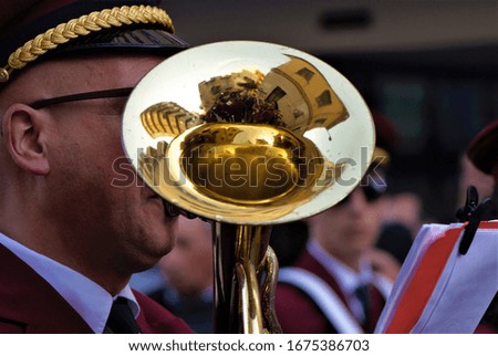 A man playing the trumpet

