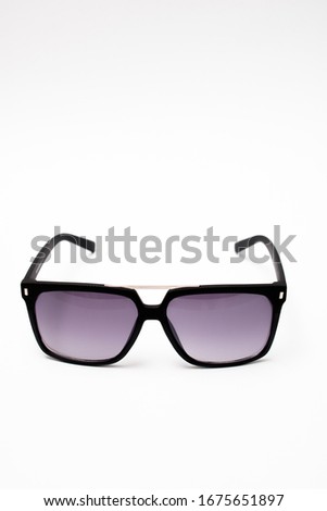 image of well-lit glasses opening white background