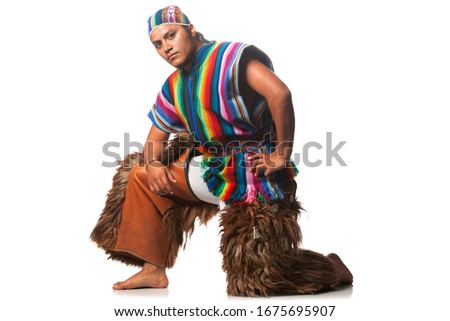 Ecuadorian dancer in traditional highland costume with llama or alpaca pants,studio shot isolated on white for authentic cultural representation.
