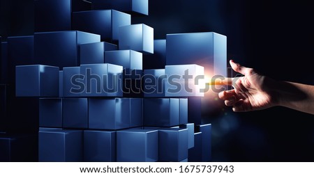 Hand holding glowing cubes. Innovation and creativity concept. Royalty-Free Stock Photo #1675737943