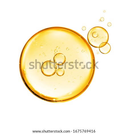 golden yellow bubble oil or serum isolated on white background Royalty-Free Stock Photo #1675769416