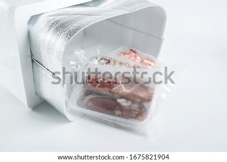 Fresh seafood food in aluminum foil bags	

