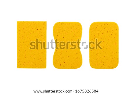 Yellow sponge isolated on white background. for cleaning and washing car  Royalty-Free Stock Photo #1675826584