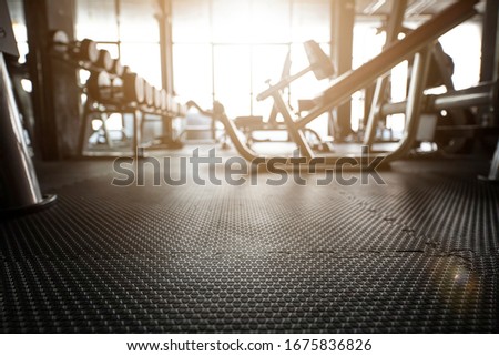 Gym background with Fitness sports equipment