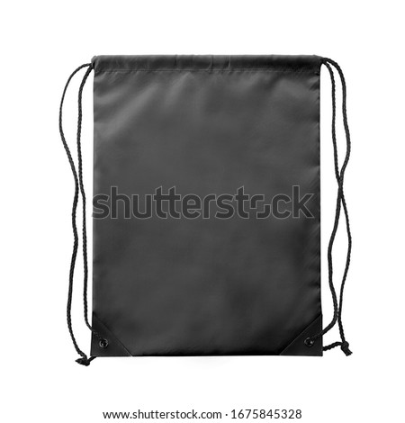 Black drawstring bag with string at both side. polyester material. Suitable for mock up, advertising, e-commerce & branding purposes. Studio photography in white background. Front view. Royalty-Free Stock Photo #1675845328