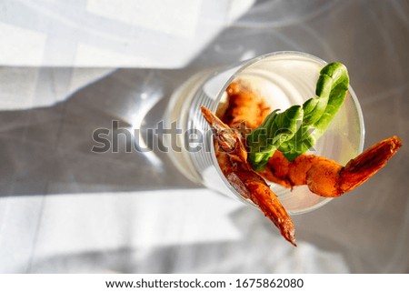 Salad prawn cocktail in a glass. appetizer for the event. buffet. top view.