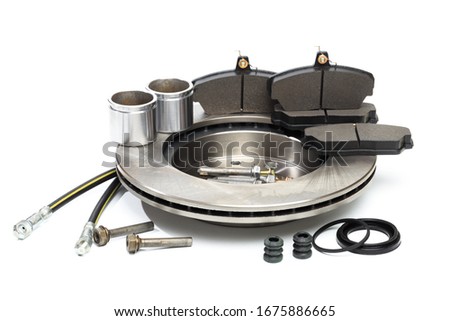 brake parts on white: brake pads, disc, brake hose, guides, cylinders - Image 