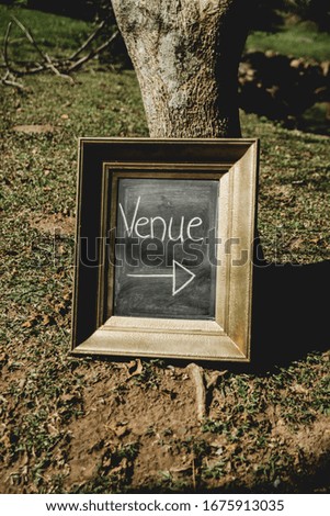 wedding black board with venue sign and decor
