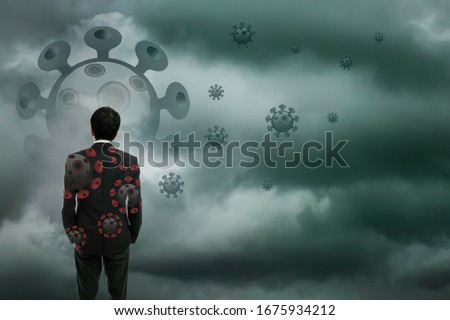 Defocused Businessman standing with corona virus or covid19 in cloudy background, Corona virus pandemic outbreak global crisis, Blurred or defocus technic Royalty-Free Stock Photo #1675934212
