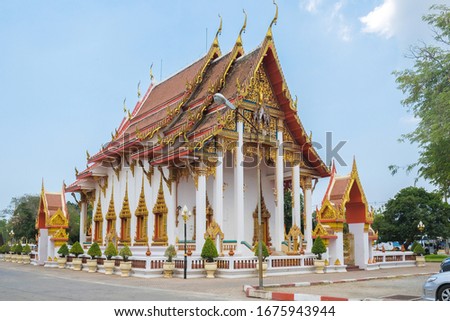 Buddhist temple with Buddha statues on a green background