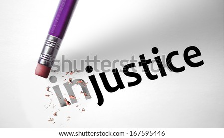 Eraser changing the word Injustice for Justice Royalty-Free Stock Photo #167595446