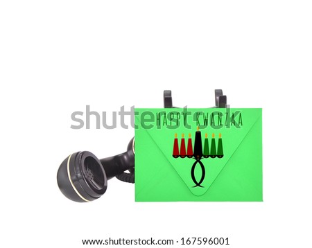 Kwanzaa Candle Holder Green Envelope Telephone Receiver isolated on white background