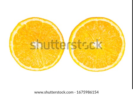 Half ripe oranges close-up and white background