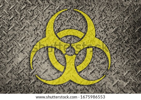 Biohazard symbol on the metallic background