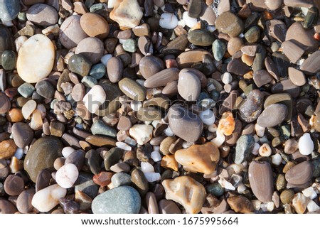 Sea pebble stones background beach rocks