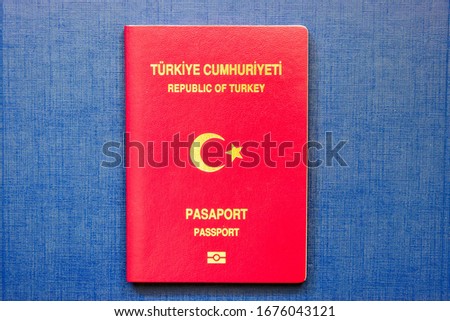 Surface Passport of Turkey isolated on blue background. National Turkish ordinary passport.