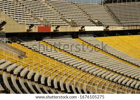 Rows of seats and stairs in soccer stadium