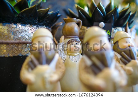 Decorative woman with a jug on her head displayed in a local interior design store