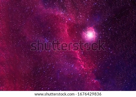 Beautiful pink cosmic nebula in deep space. Elements of this image were furnished by NASA.