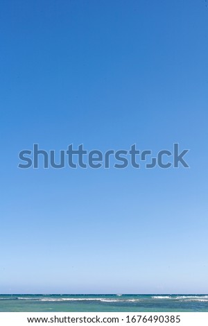 Gradient clear blue sky with sea horizon Royalty-Free Stock Photo #1676490385